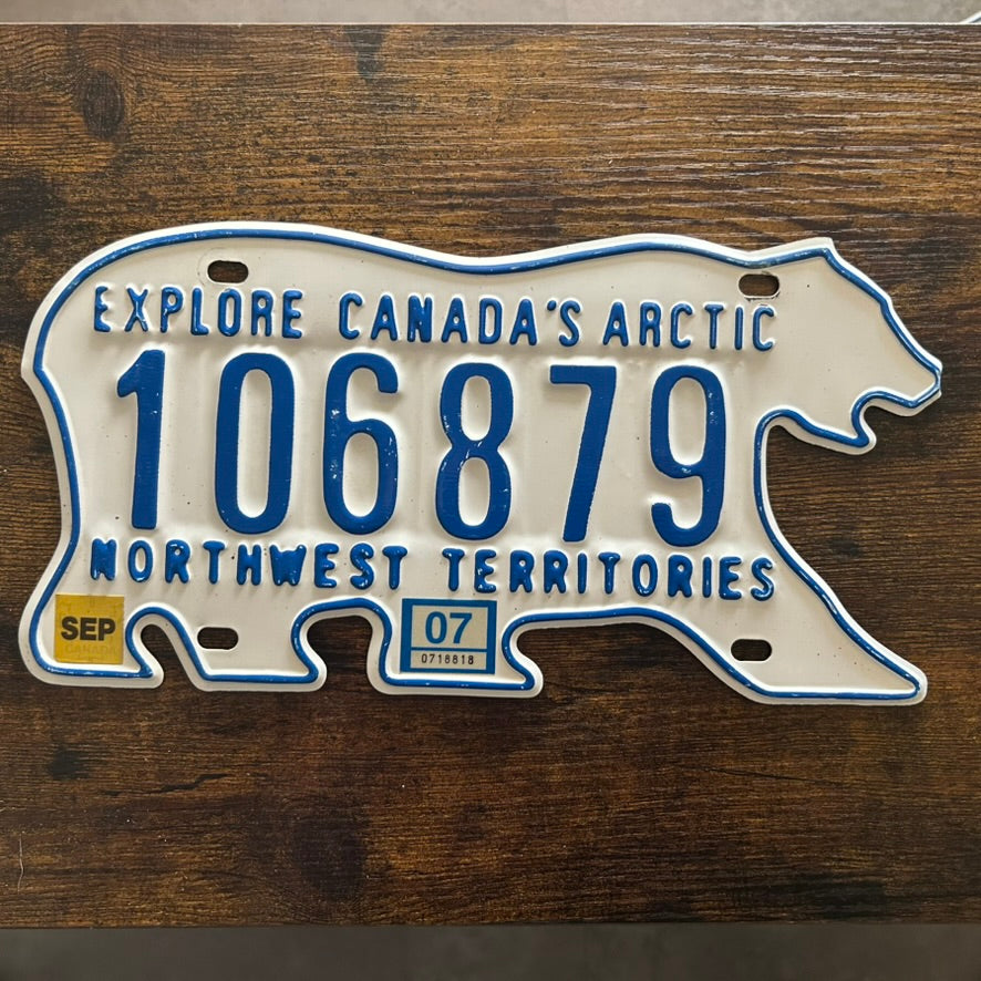 106879