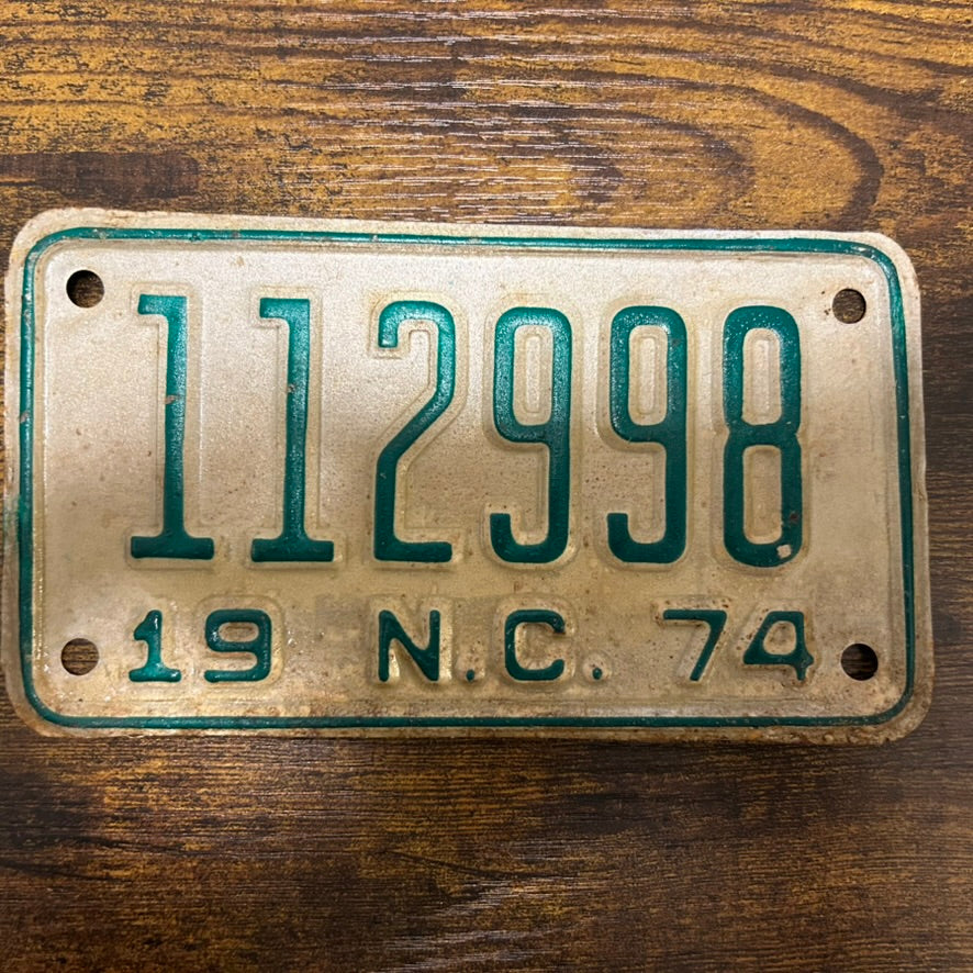 112998