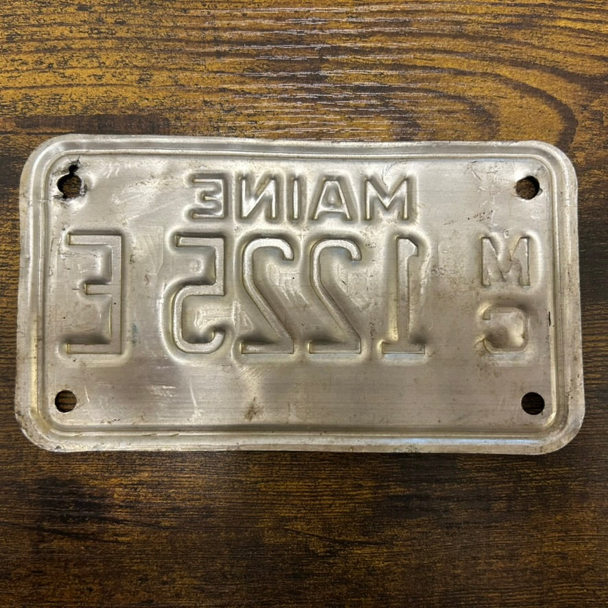 1225 E