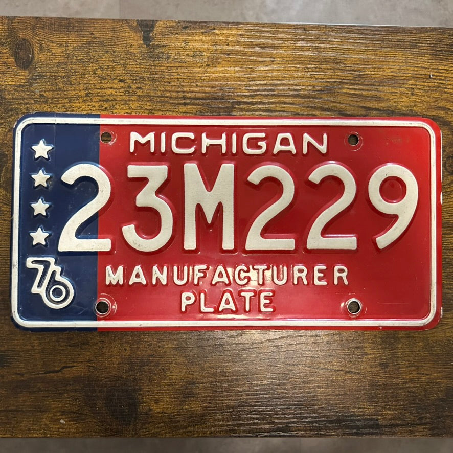 23M229